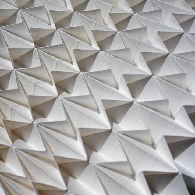 A picture of some paper sheets folded in a nice pattern